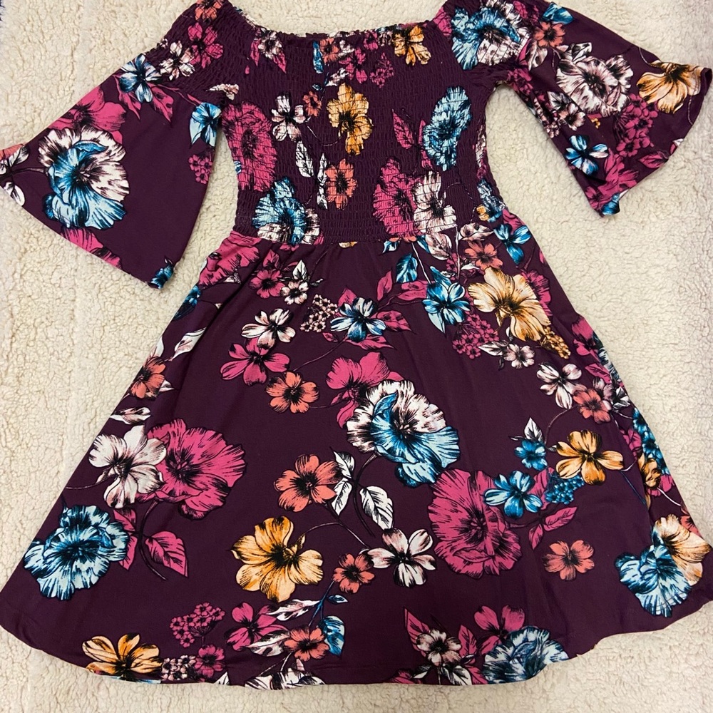 Dress with unique flower design.